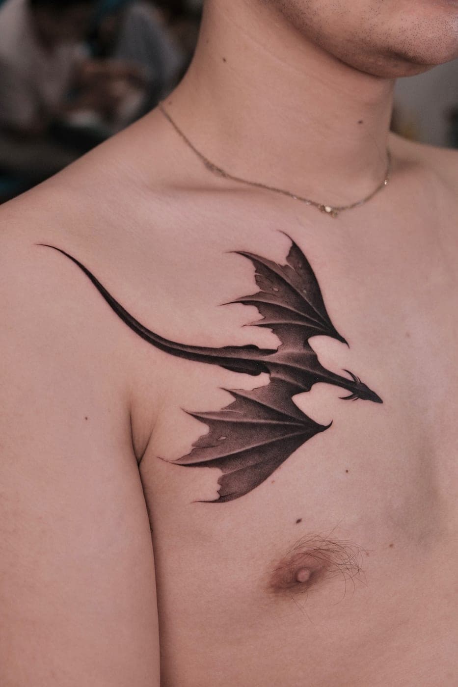 Hình xăm black & grey cánh rồng